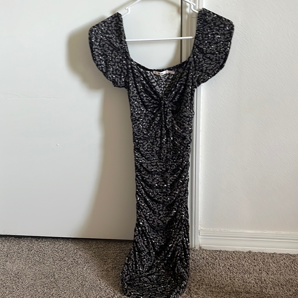 Skin tight black mini dress size XXS (would fit best for sizes 0-4 in dresses)